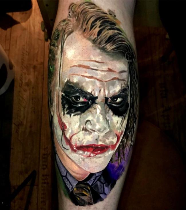 Gizemli ve son derece çekici dolu Joker dövme desenleri koleksiyonu