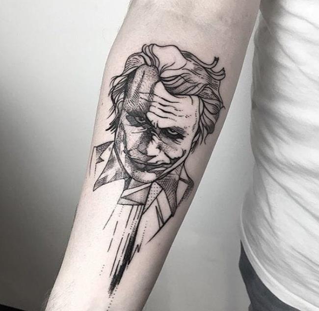 Gizemli ve son derece çekici dolu Joker dövme desenleri koleksiyonu