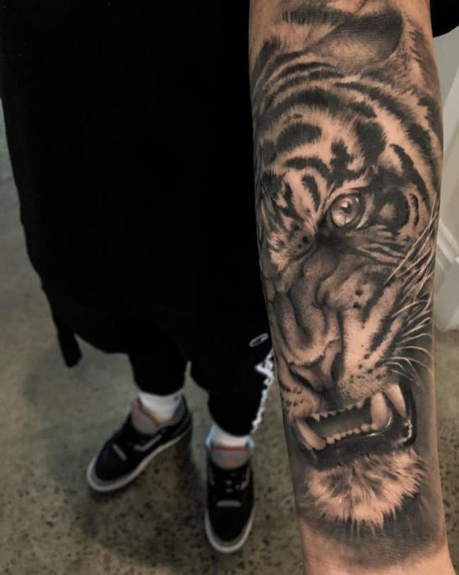 Sammlung von kraftvollen und beeindruckenden Tiger Tattoo Mustern
