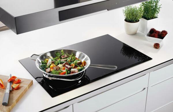 What is the difference between an induction hob and an infrared stove?