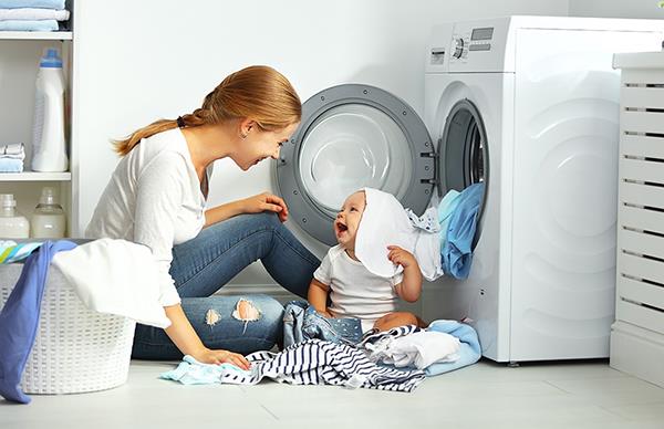 Why are clothes dried in the dryer soft and in the sun hard and rough?