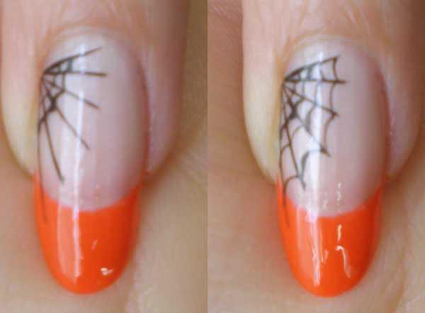 Halloween nail art with spiders and cobwebs