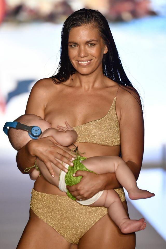 MOTHER - Bikini model's mother breast-feeding while performing on the catwalk