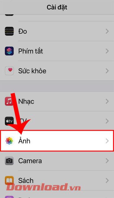 Instrucciones para buscar fotos usando la barra Spotlight en iPhone