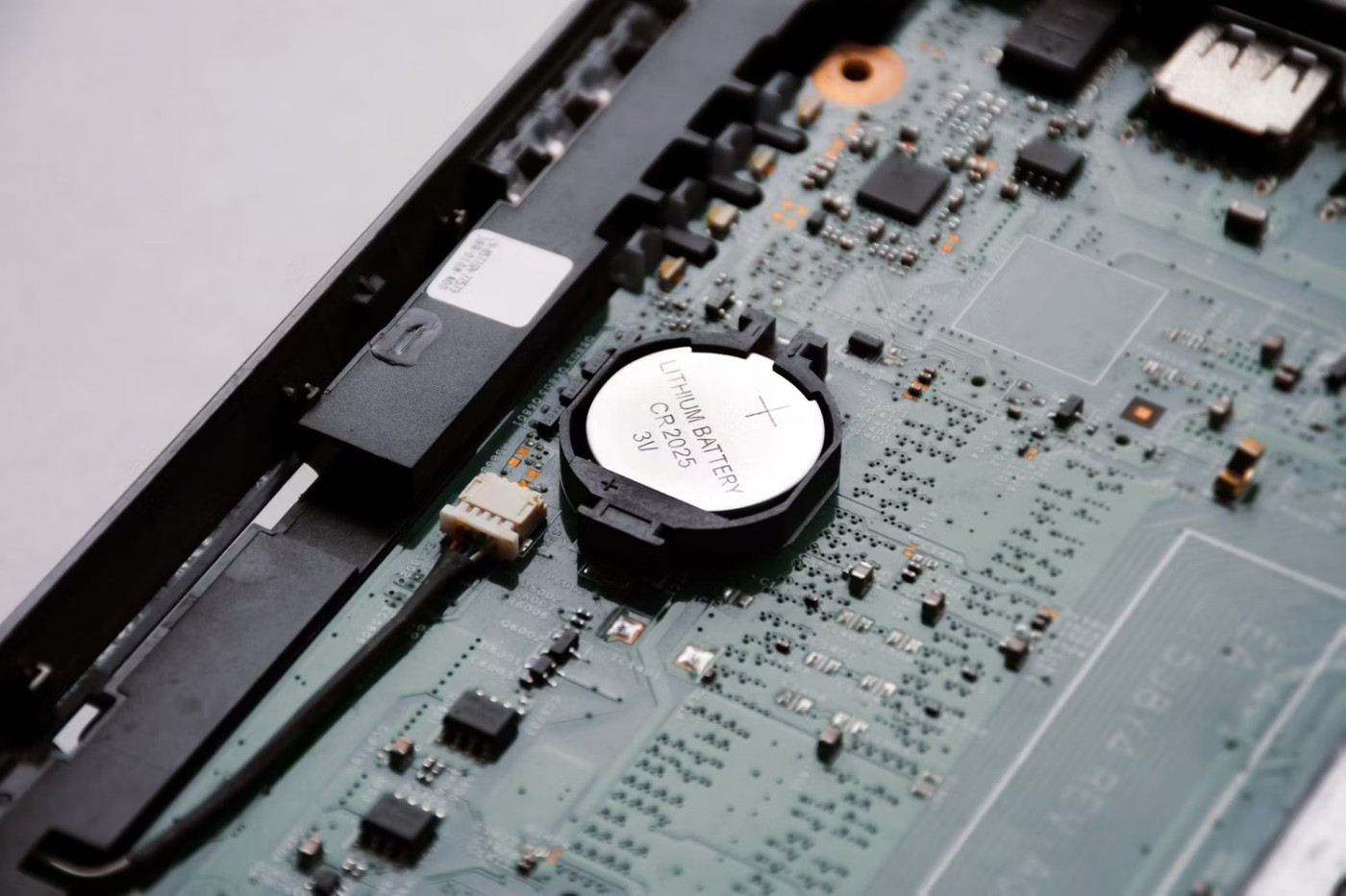 Hoe vervang ik de CMOS-batterij?