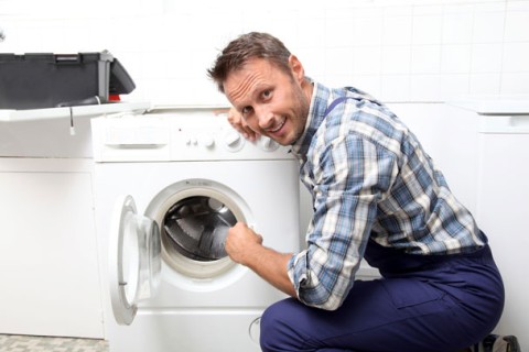 Should I close or open the washing machine door after washing?