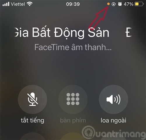 Was ist der orange-grüne Punkt in der Ecke des iPhone-Bildschirms?